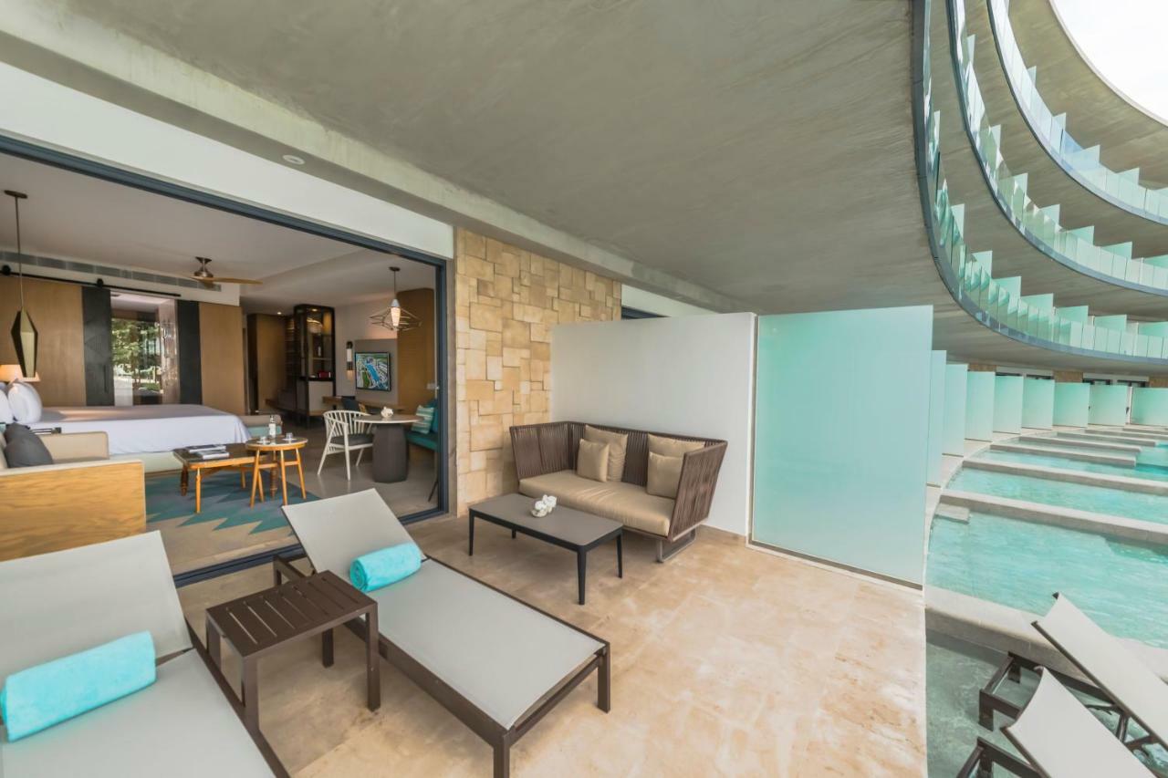 Haven Riviera Cancun (Adults Only) Alfredo V. Bonfil Luaran gambar A 3D rendering of a hotel room